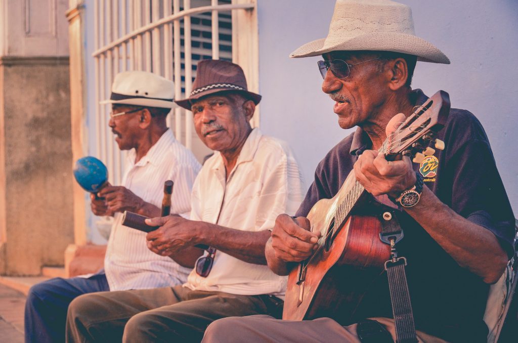 Three Men Playing Musical Instruments 1845844